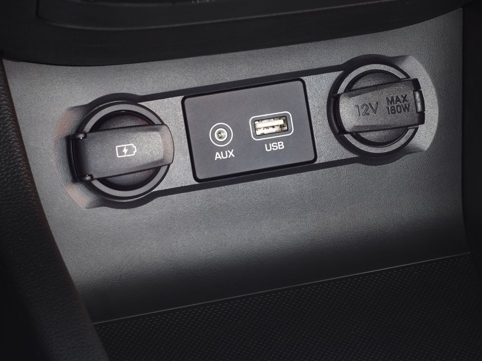 AUX-in and USB ports in a Hyundai middle console.